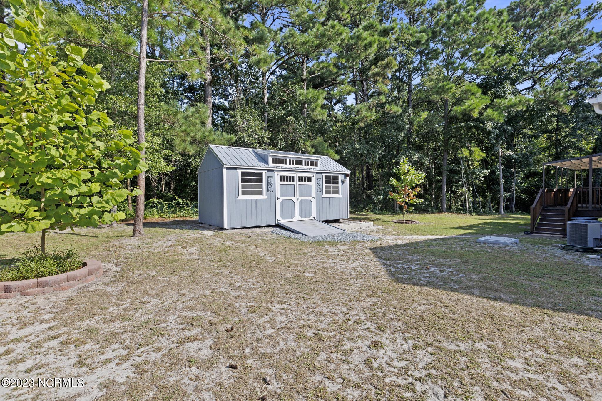 107 A Colbert Lane Hampstead, NC 28443 - Photo 29 of 32 Storage Shed