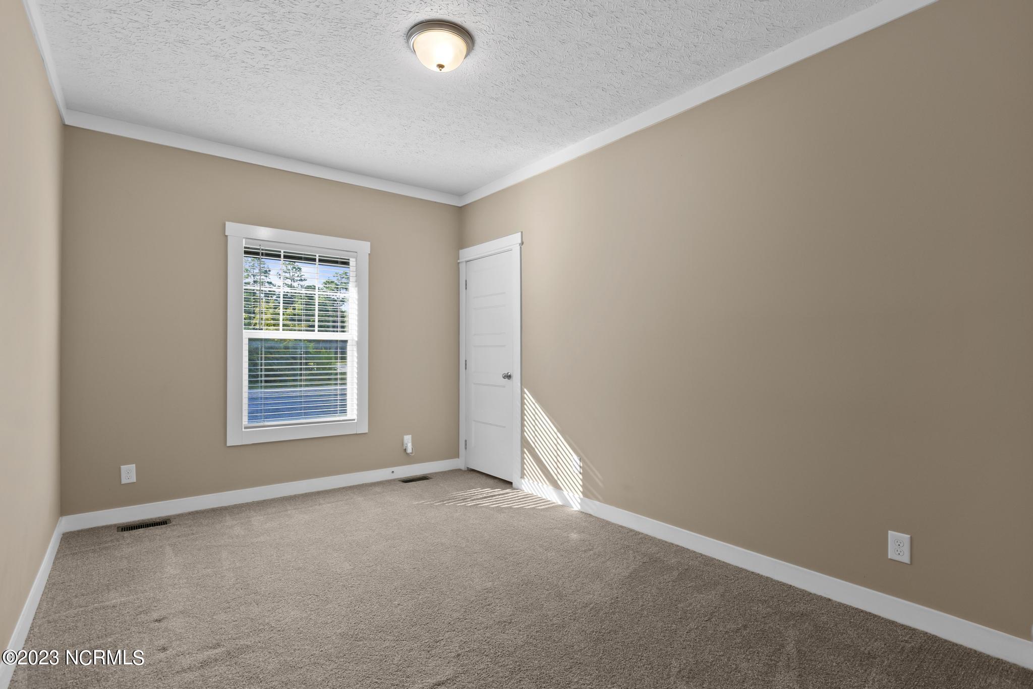 107 A Colbert Lane Hampstead, NC 28443 - Photo 8 of 32 Front Bedroom