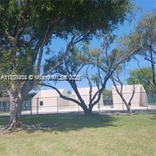 Kendale Lakes Miami, FL 33183 - Photo 5 of 18 a view of a yard in front of the house