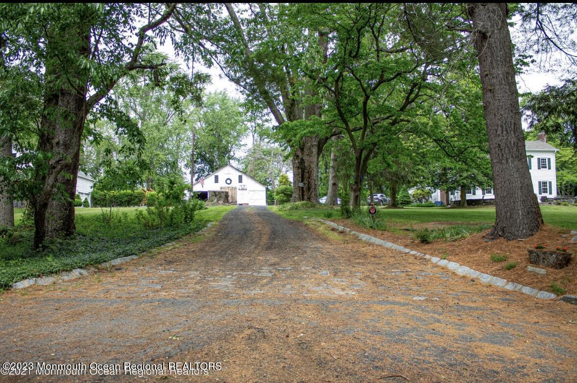 415 Pleasant Valley Road Morganville, NJ 07751 - Photo 6 of 16 a view of a park with large trees