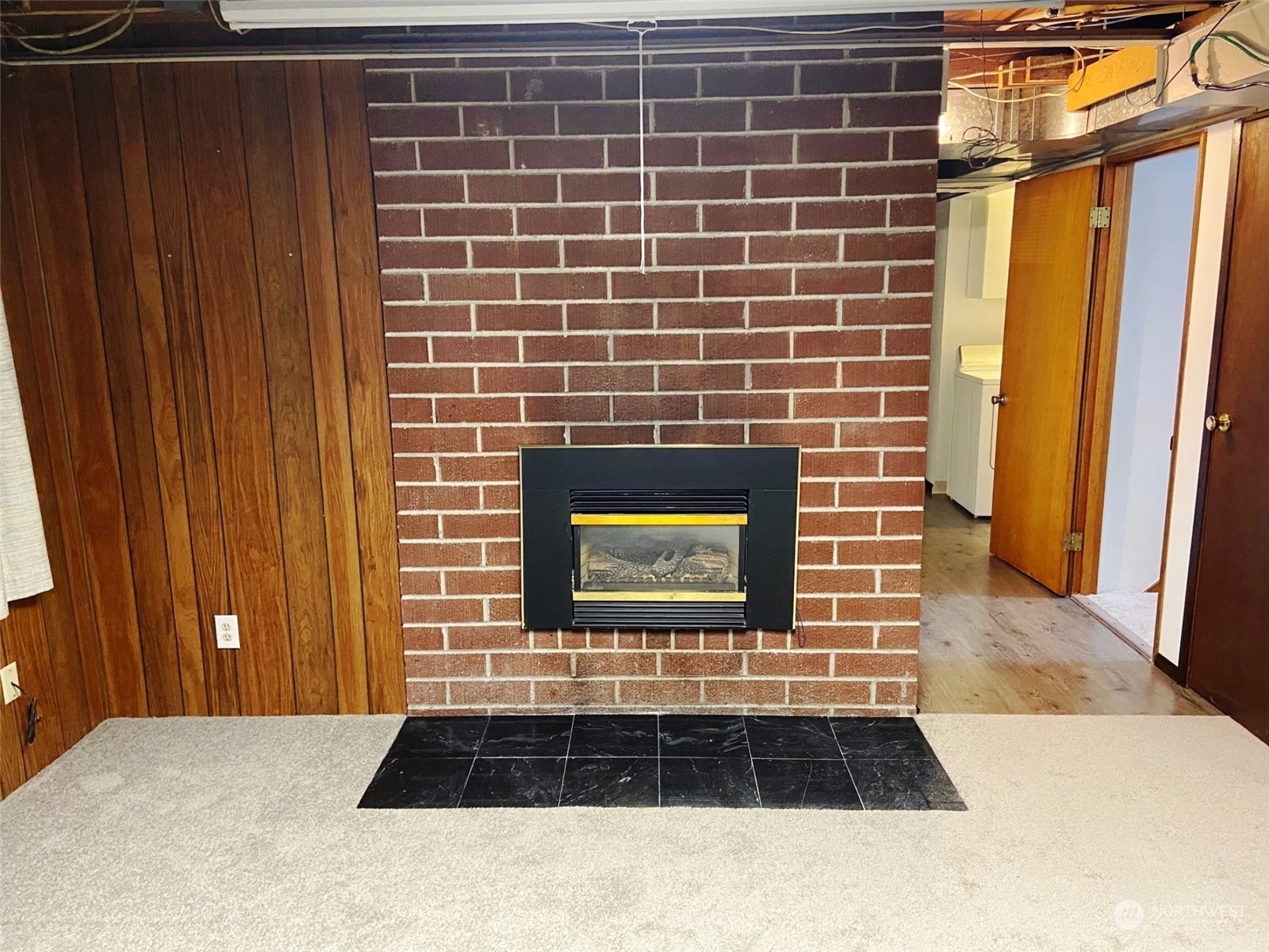 12733 2nd Avenue Southwest Burien, WA 98146 - Photo 16 of 27 a view of a brick house with a large window
