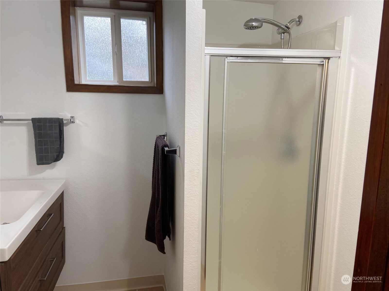 12733 2nd Avenue Southwest Burien, WA 98146 - Photo 18 of 27 a bathroom with a shower and a sink