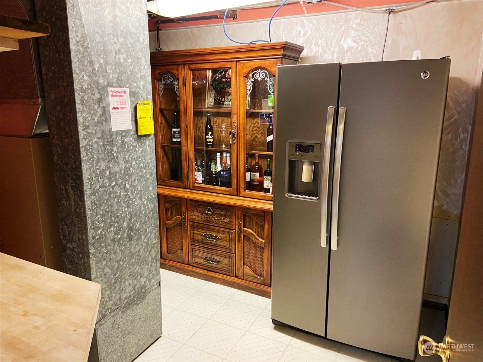 12733 2nd Avenue Southwest Burien, WA 98146 - Photo 20 of 27 a close view of a refrigerator in the kitchen