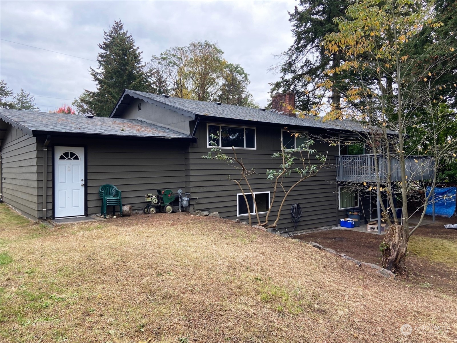 12733 2nd Avenue Southwest Burien, WA 98146 - Photo 24 of 27 a view of a house with a yard and garage