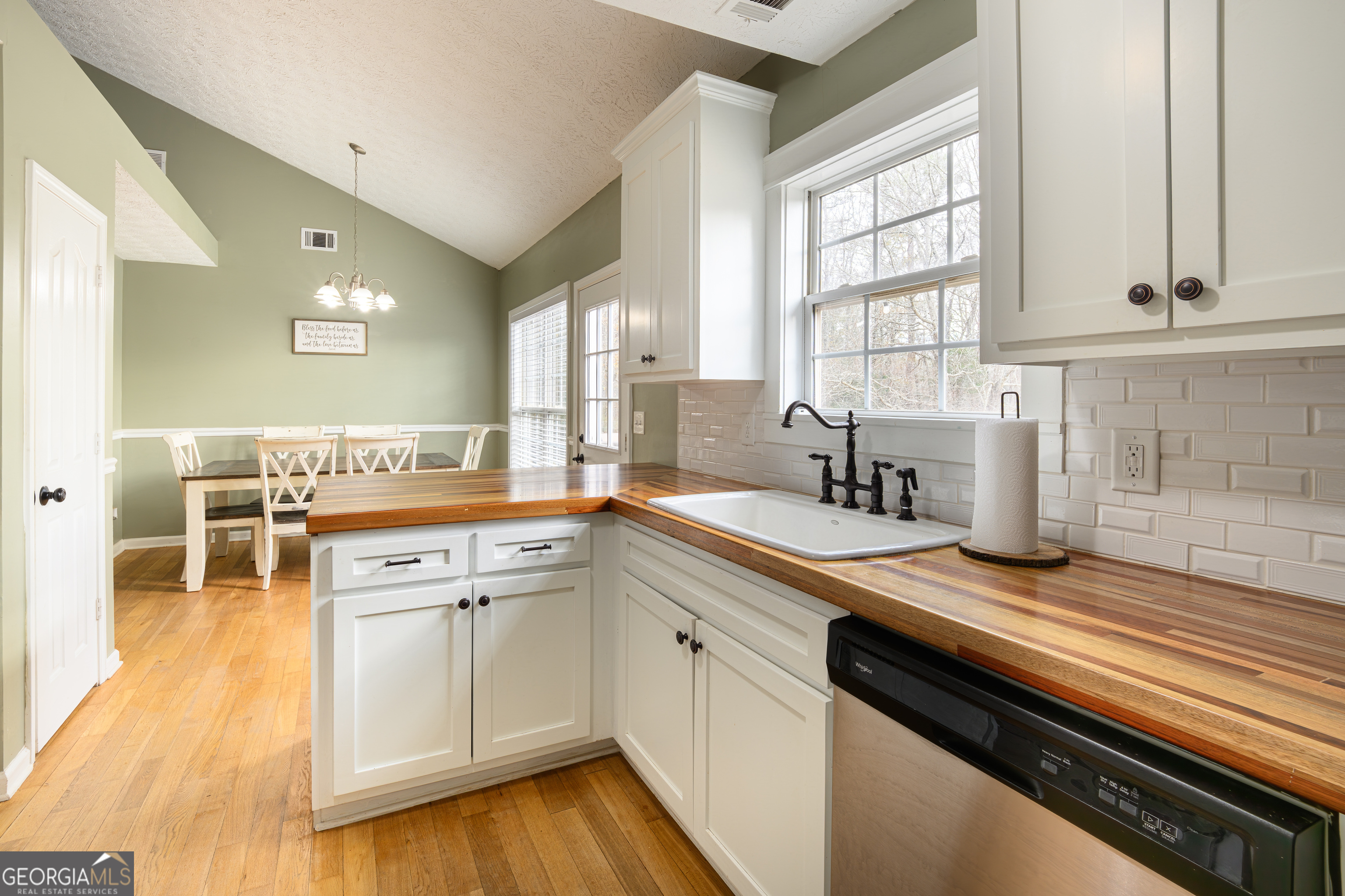 171 Hunter Road Griffin, GA 30224 - Photo 17 of 31 a kitchen with a sink and cabinets