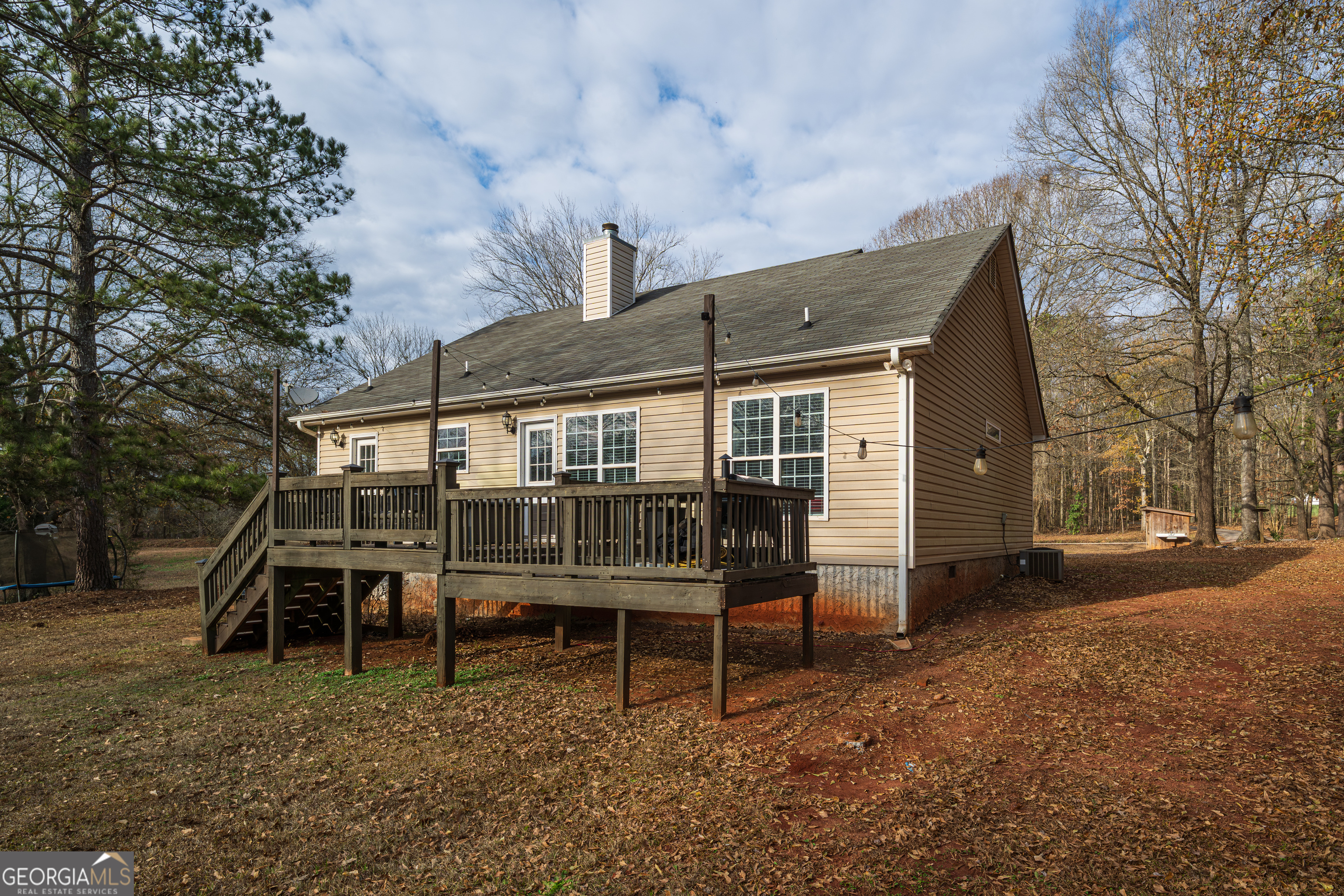 171 Hunter Road Griffin, GA 30224 - Photo 5 of 31 a backyard of a house with table and chairs