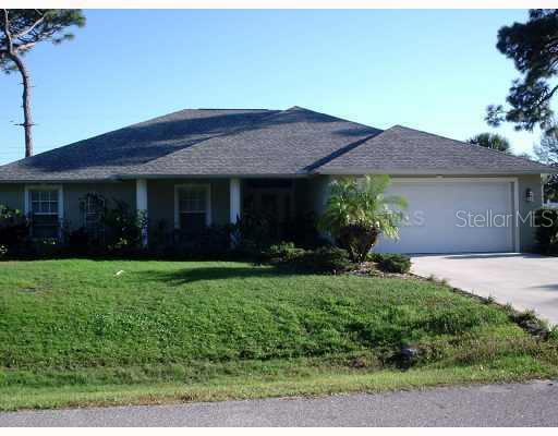 232 Tanager Road Venice, FL 34293 - Photo 1 of 1 a view of a house with garden and yard