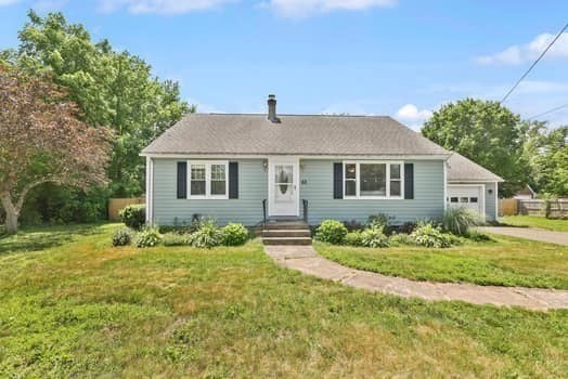 61 East Longmeadow Road Hampden, MA 01036 - Photo 1 of 38 a front view of a house with garden