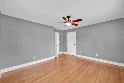 61 East Longmeadow Road Hampden, MA 01036 - Photo 23 of 38 a view of room with a ceiling fan and wooden floor