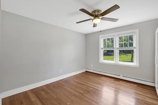 61 East Longmeadow Road Hampden, MA 01036 - Photo 30 of 38 an empty room with wooden floor and windows
