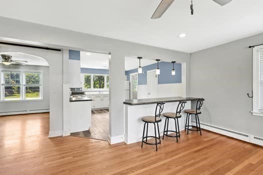 61 East Longmeadow Road Hampden, MA 01036 - Photo 8 of 38 a kitchen with stainless steel appliances kitchen island hardwood floor and a sink