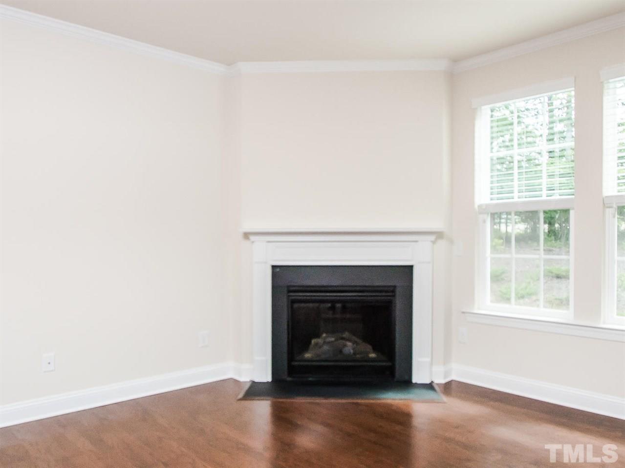 6508 Ridgemount Street Wake Forest, NC 27587 - Photo 11 of 24 This wonderful family room at 6508 Ridgemount is spacious open and airy. Entertaining will be a breeze with this open floor concept home. This beautiful fireplace with detail mantle is a great focal point of the room.