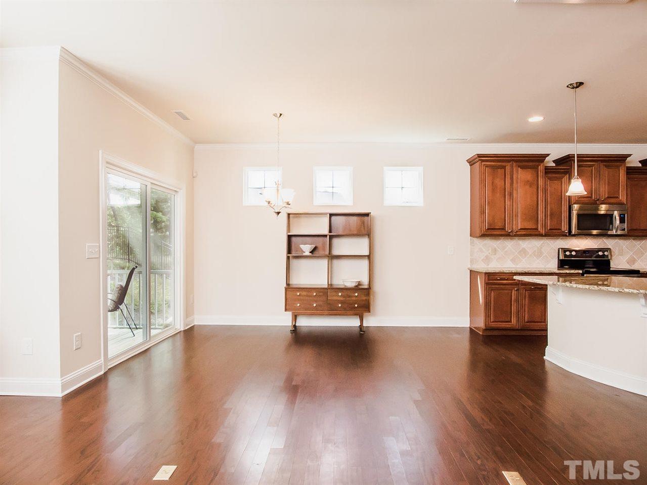 6508 Ridgemount Street Wake Forest, NC 27587 - Photo 12 of 24 Open and airy...enjoy casual meals in your new eating nook at 6508 Ridgemount. Notice the three windows at the top...very stylish and allows more natural light into the room!
