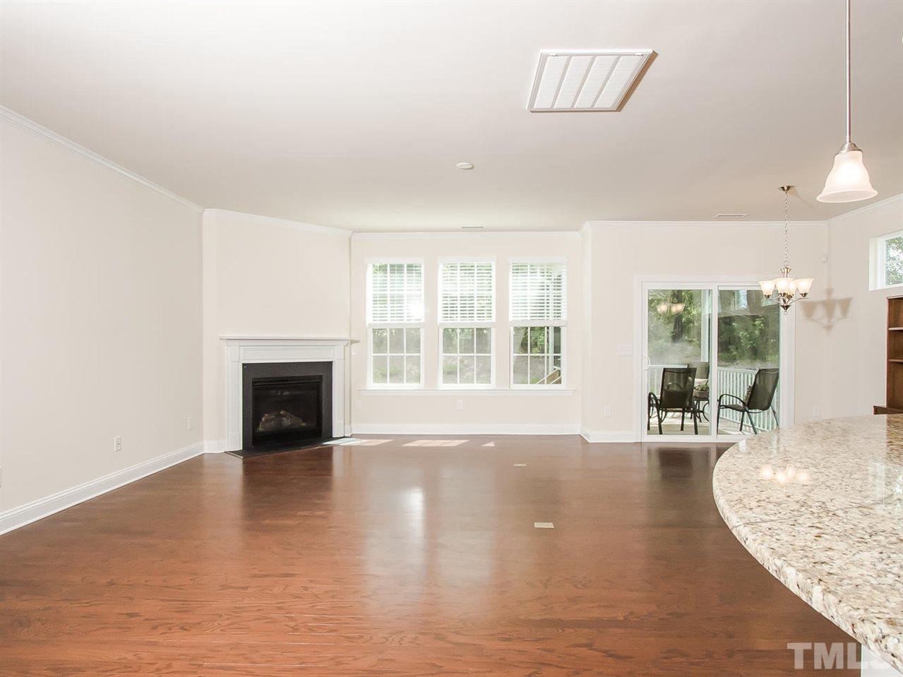 6508 Ridgemount Street Wake Forest, NC 27587 - Photo 23 of 24 The family room at 6508 Ridgemount is large and open to the breakfast room and kitchen. This floor plan is great for entertaining or just being part of the family activities.