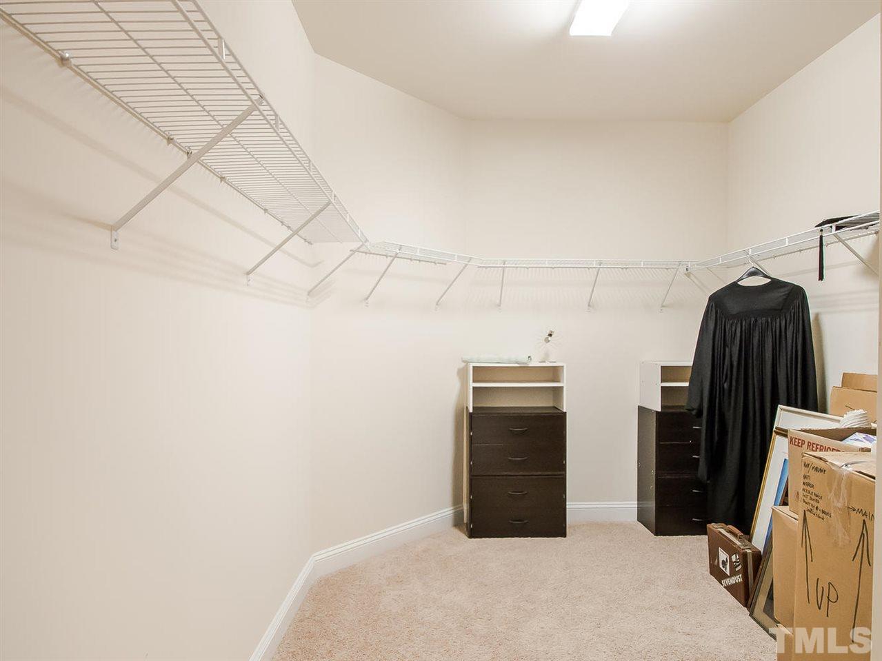 6508 Ridgemount Street Wake Forest, NC 27587 - Photo 5 of 24 Can you believe the size of this master closet at 6508 Ridgemount? It is another great surprise when you walk in. There is plenty of room for everyone. Space for dresses, shoes, purses!!
