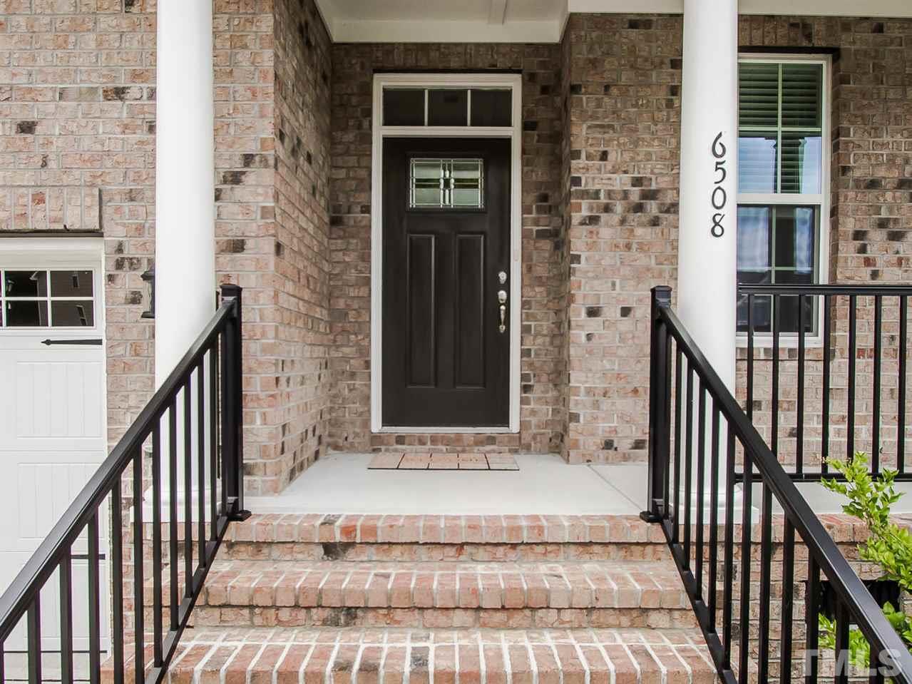 6508 Ridgemount Street Wake Forest, NC 27587 - Photo 6 of 24 Welcome your guest to your new home at 6508 Ridgemount. Your family, friends and neighbors will be impressed with the brick front and large rocking chair front porch.