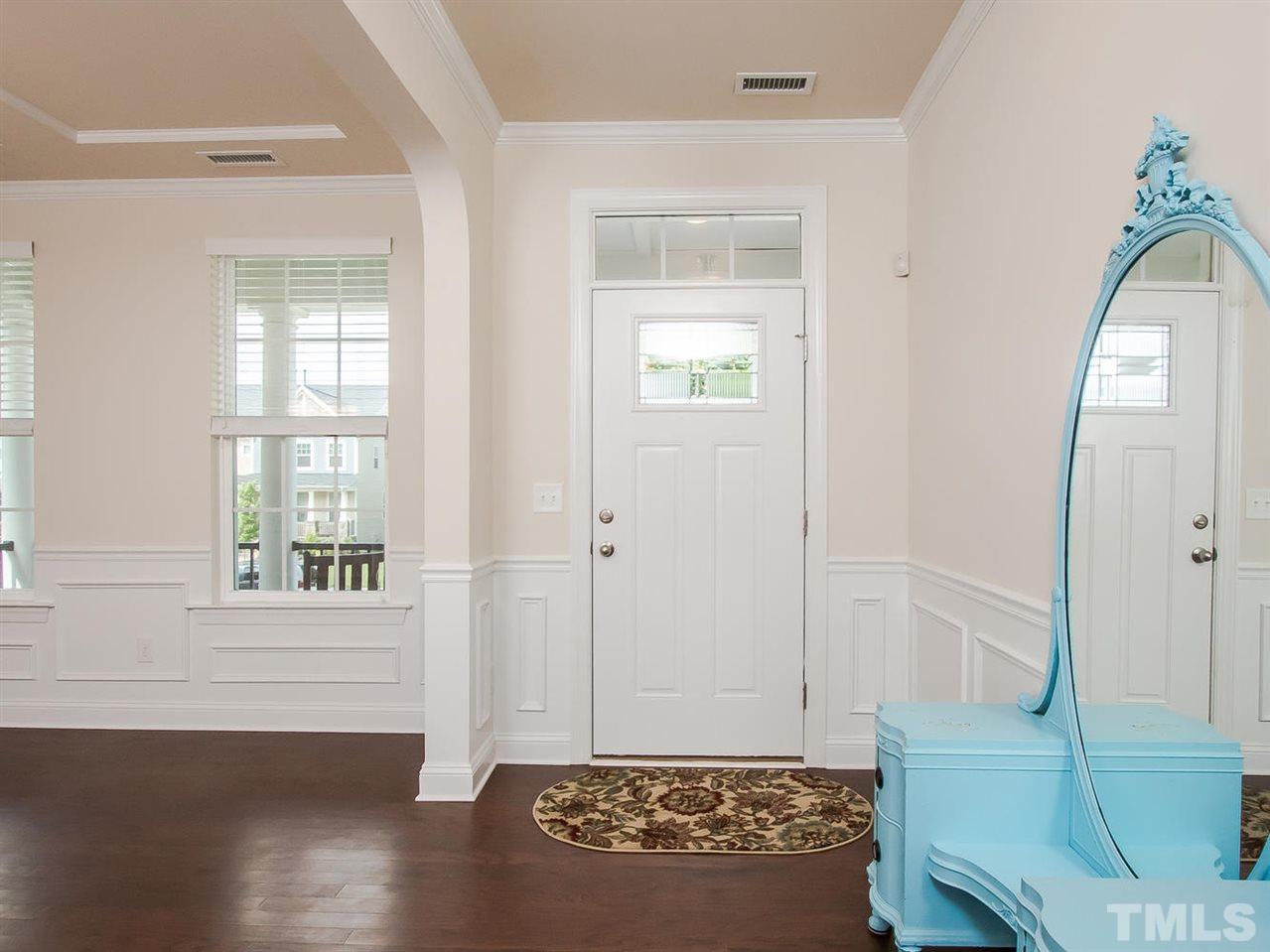 6508 Ridgemount Street Wake Forest, NC 27587 - Photo 8 of 24 This gorgeous entry at 6508 Ridgemount makes a grand statement. Open flowing into the dining room and family room, this space is large enough for your foyer table.