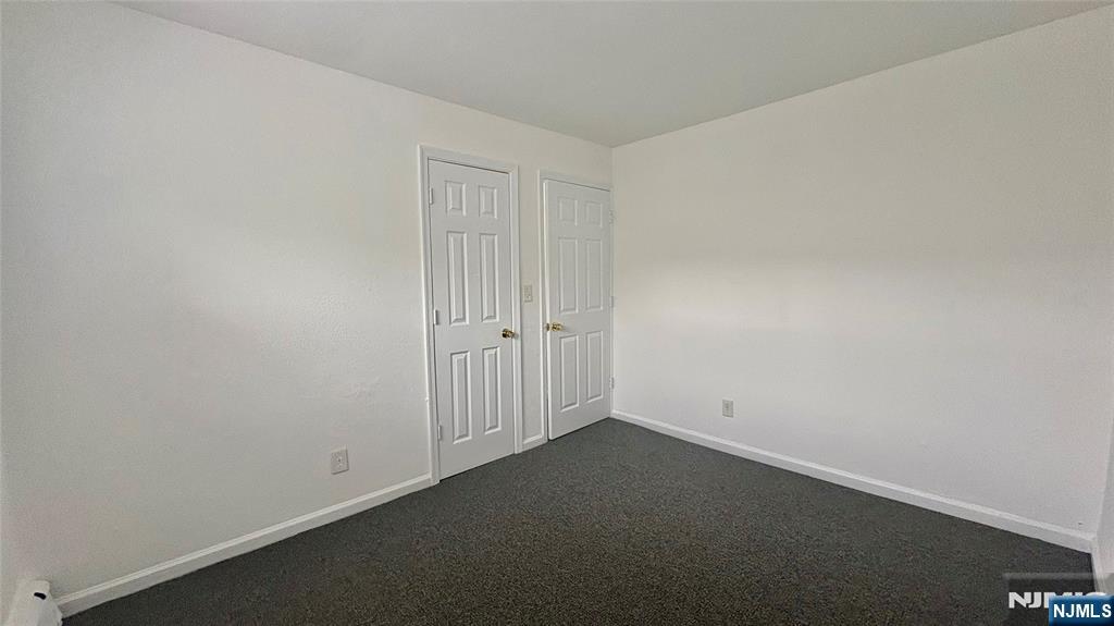 299 Main Street, Unit 7 Lodi, NJ 07644 - Photo 12 of 14 an empty room with a empty space