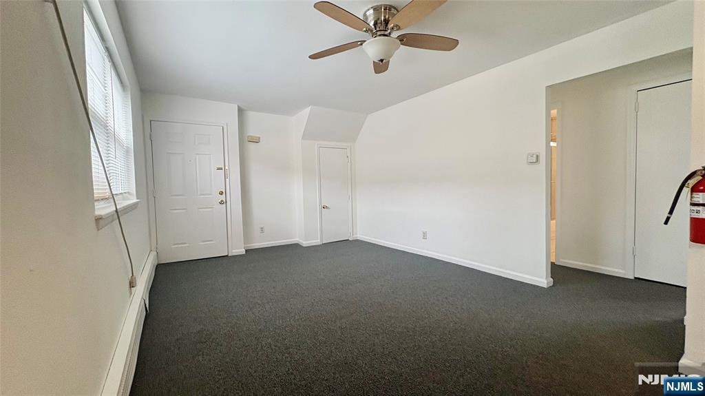 299 Main Street, Unit 7 Lodi, NJ 07644 - Photo 3 of 14 a view of empty room with ceiling fan