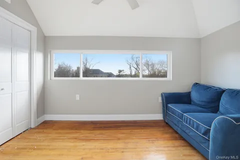 a view of livingroom with furniture and wooden floor