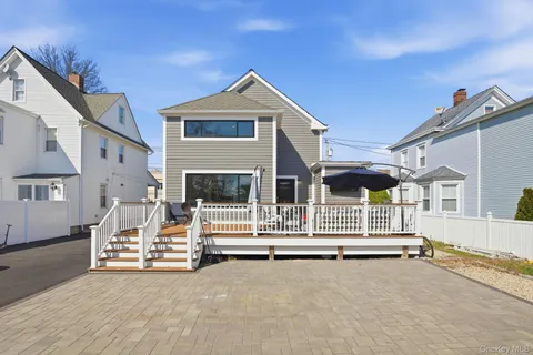 a view of a house with a street