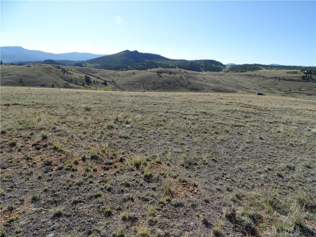 415 Arland Road Como, CO 80432 - Photo 14 of 19 a view of a large mountain with a mountain in the background
