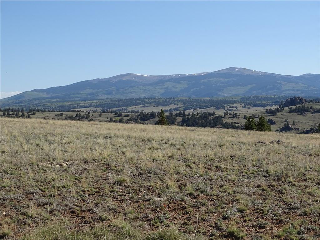 415 Arland Road Como, CO 80432 - Photo 18 of 19 a view of an outdoor space and a yard
