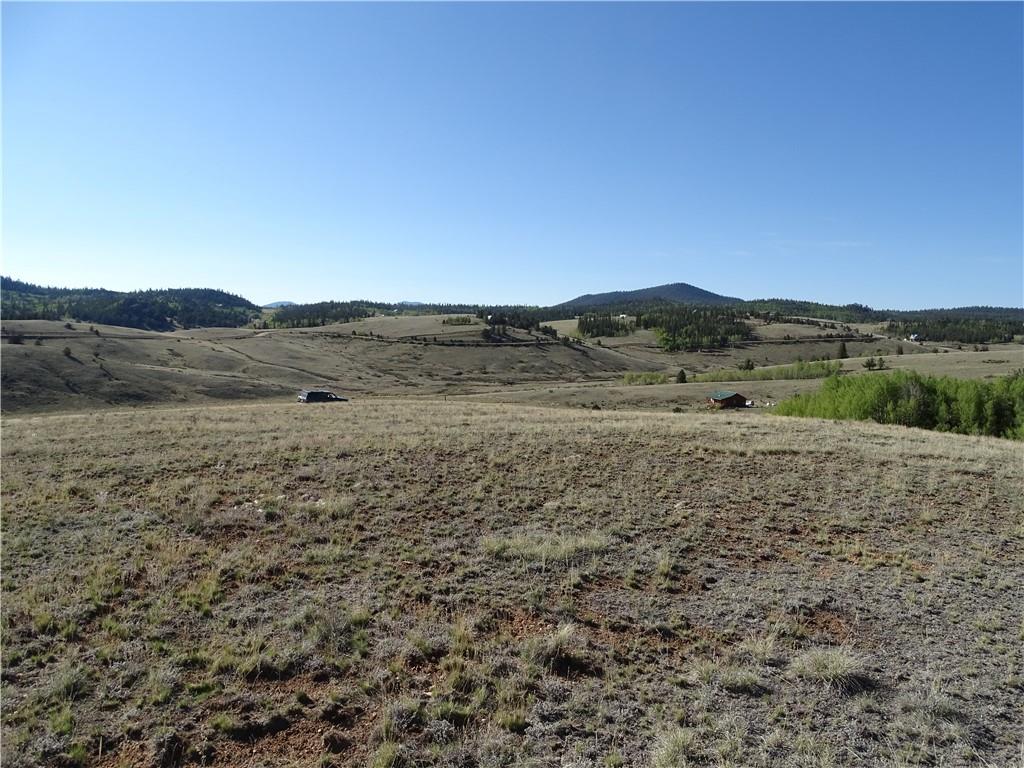 415 Arland Road Como, CO 80432 - Photo 5 of 19 a view of an outdoor space and a yard