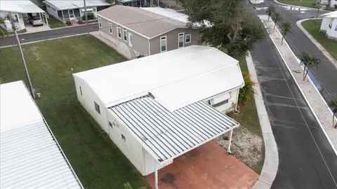 a view of a swimming pool with a patio