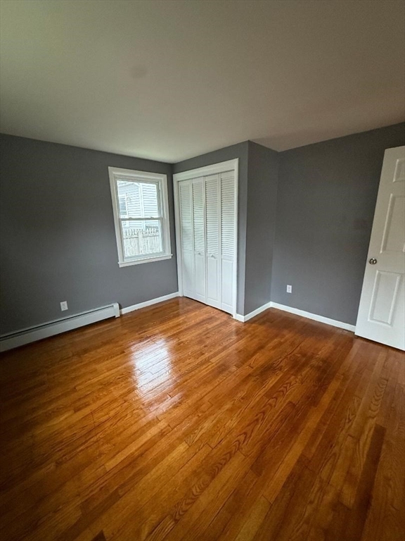 45 Penacook Street Springfield, MA 01104 - Photo 15 of 27 a view of empty room with wooden floor