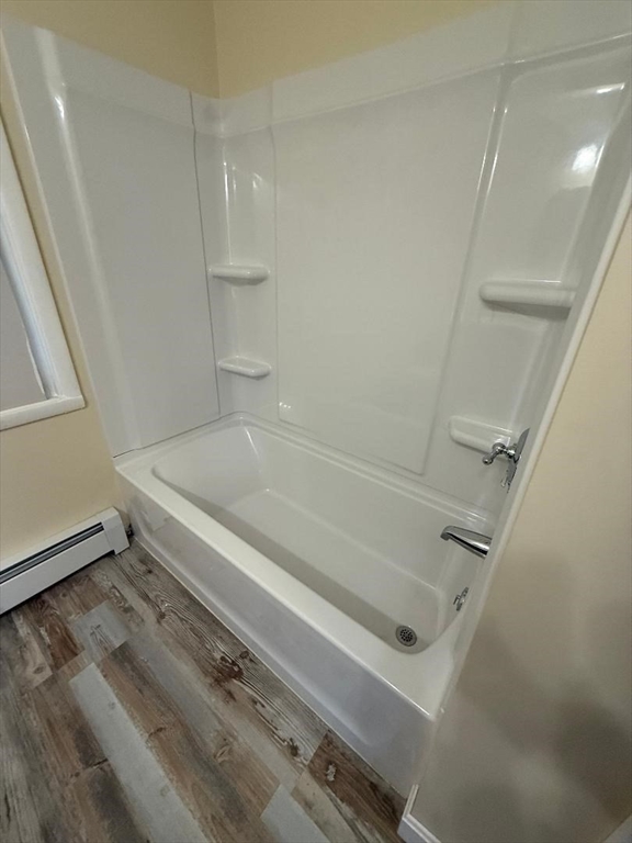 45 Penacook Street Springfield, MA 01104 - Photo 17 of 27 a bathroom with a bathtub