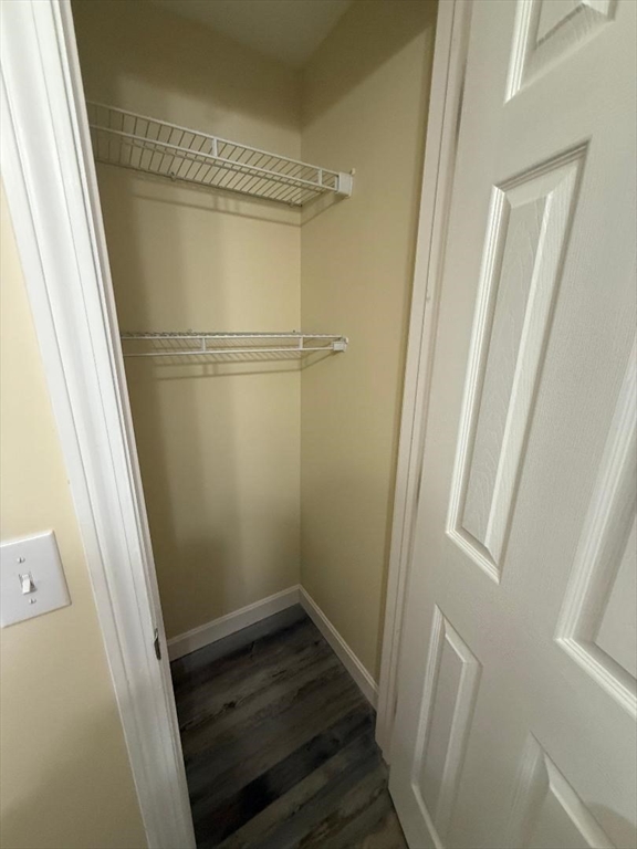 45 Penacook Street Springfield, MA 01104 - Photo 19 of 27 a bathroom with a wooden floor and a shower