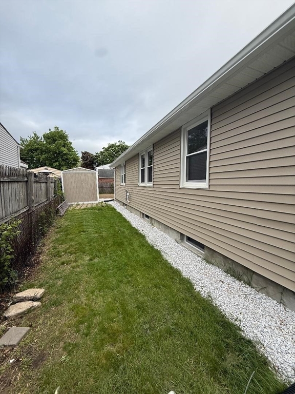 45 Penacook Street Springfield, MA 01104 - Photo 4 of 27 a view of a backyard with a garden