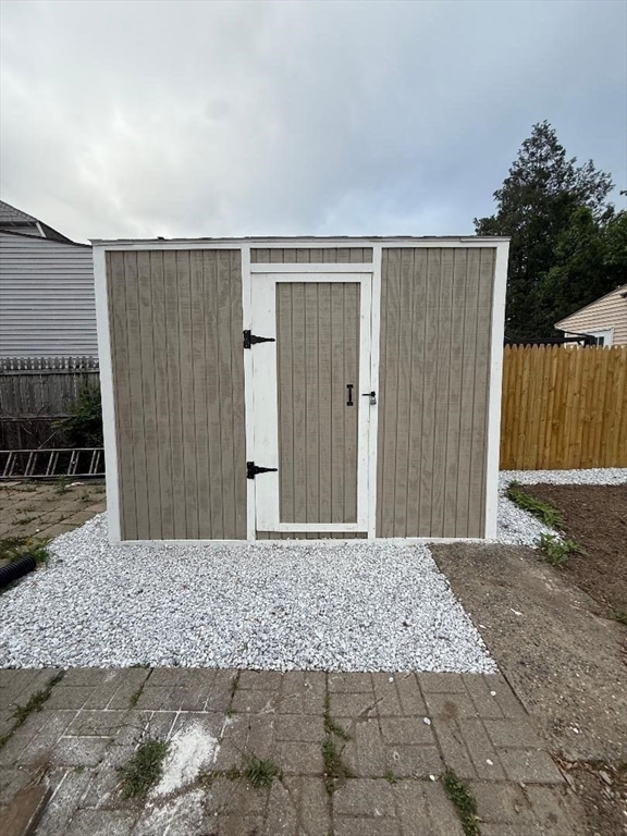 45 Penacook Street Springfield, MA 01104 - Photo 5 of 27 a view of a house with a wooden fence