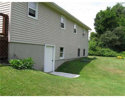 14 Cross Road Unity, ME 04988 - Photo 3 of 13 Exterior Back. The walkout basement...