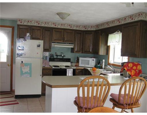 14 Cross Road Unity, ME 04988 - Photo 4 of 13 Kitchen. The open kitchen and dining...
