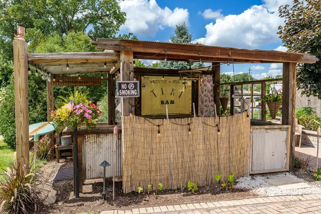 a kitchen with stainless steel appliances granite countertop a sink and a stove