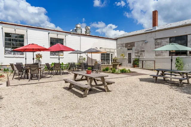 a kitchen with a stove and a refrigerator