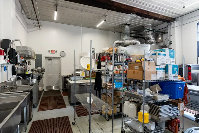 a view of a dining area with furniture and chandelier