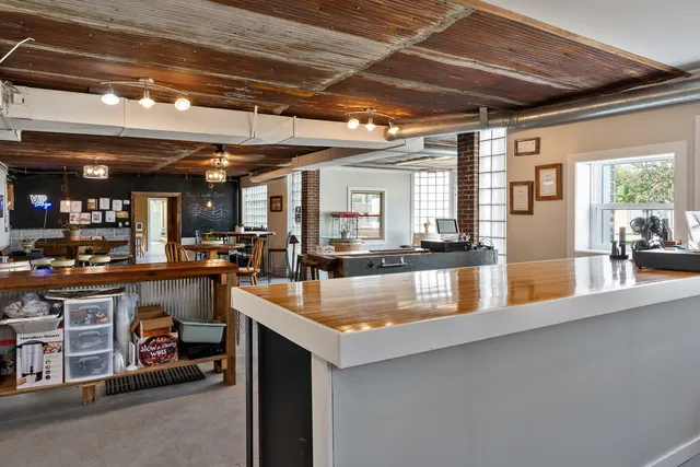 a view of a garden with potted plants