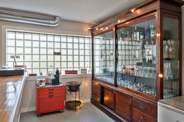 a view of a car parked in front of a building