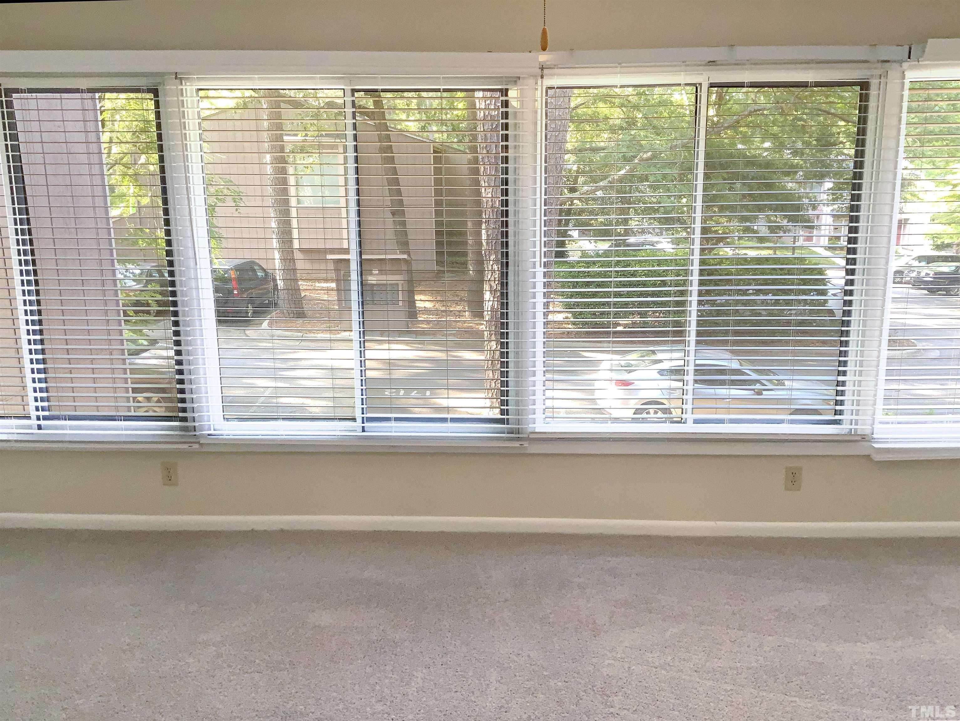 1710 Quail Ridge Road Raleigh, NC 27609 - Photo 13 of 16 a view of empty room with front door