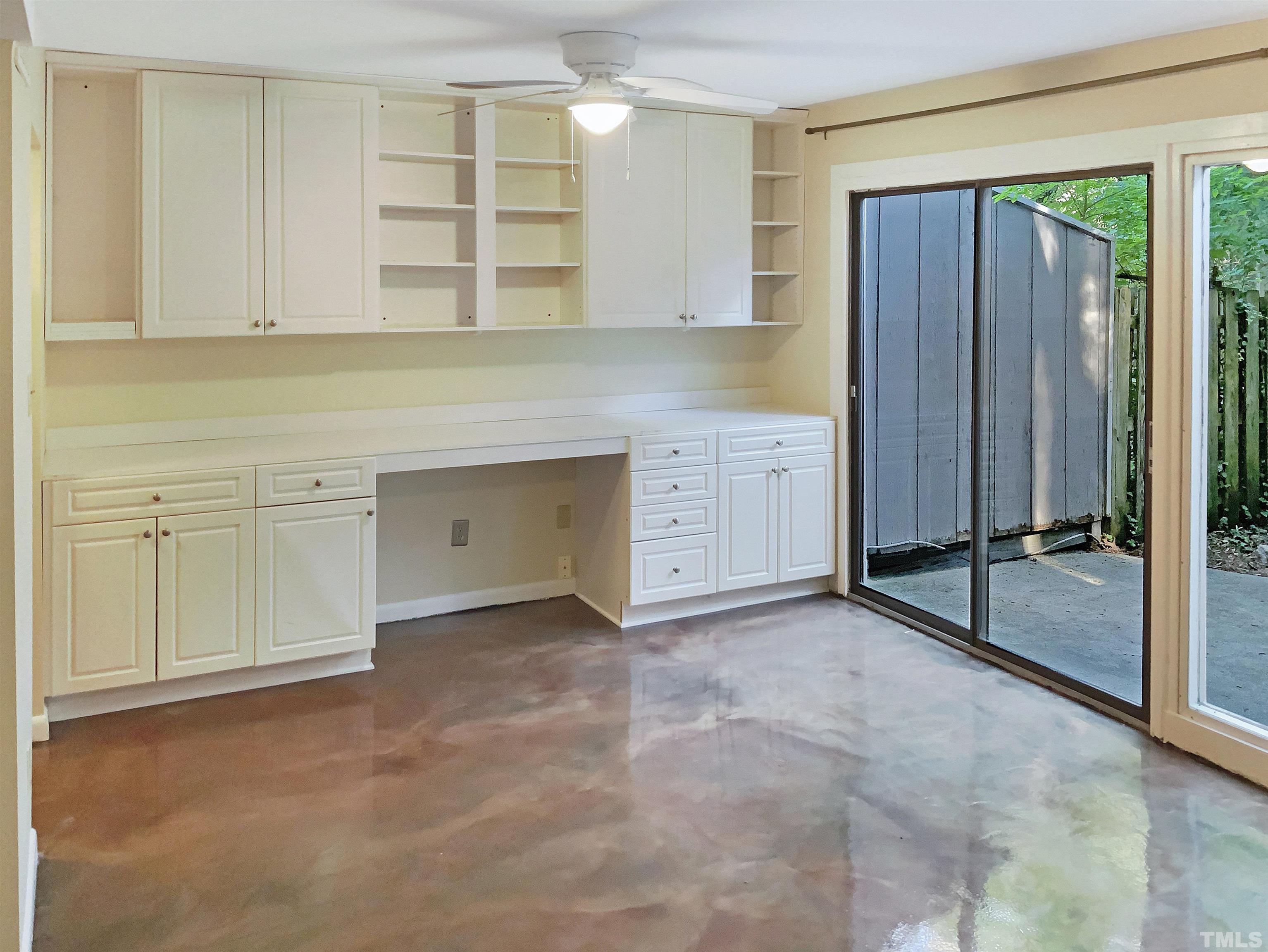 1710 Quail Ridge Road Raleigh, NC 27609 - Photo 9 of 16 a view of a kitchen with wooden cabinets