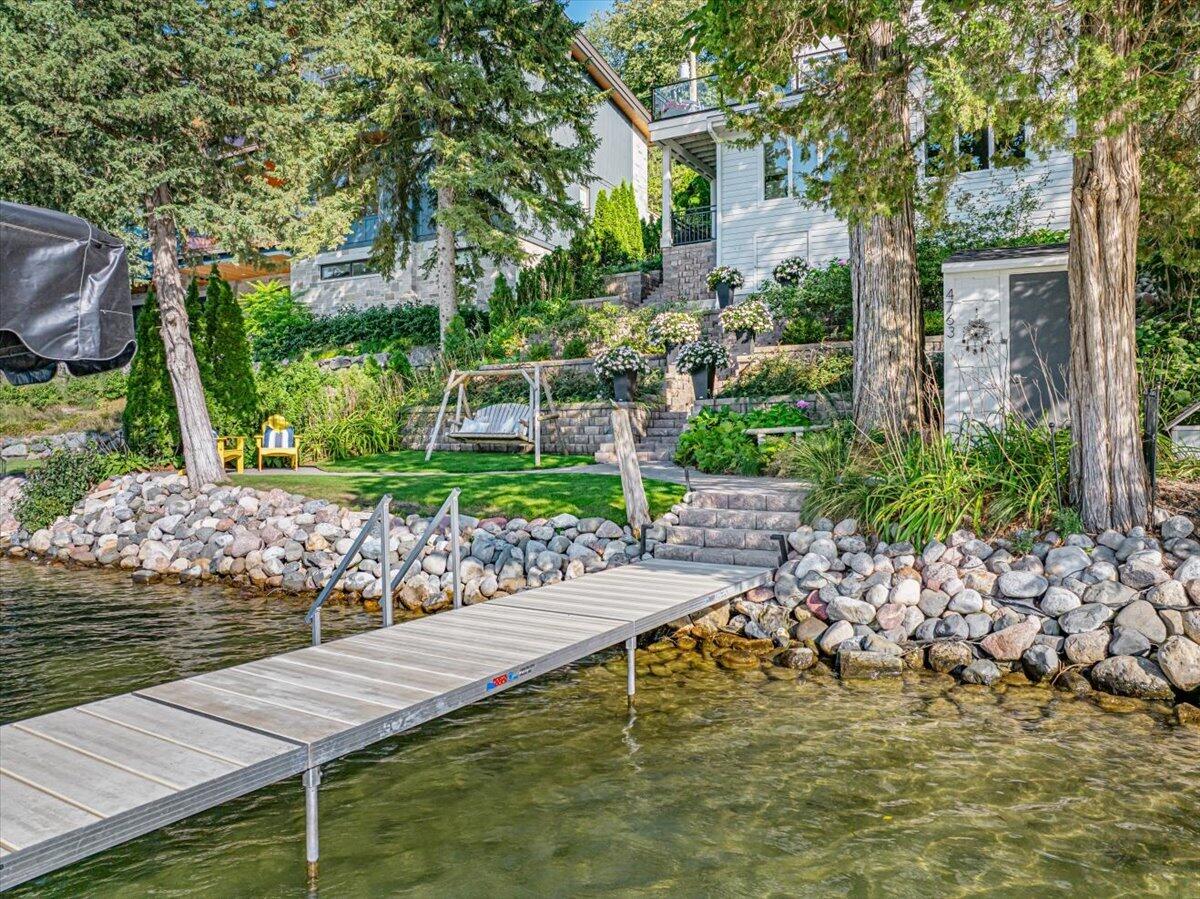 4763 Fontana Beach Road Polk, WI 53086 - Photo 49 of 61 Beautiful, low maintenance landscaping! More time to spend out on the water!
