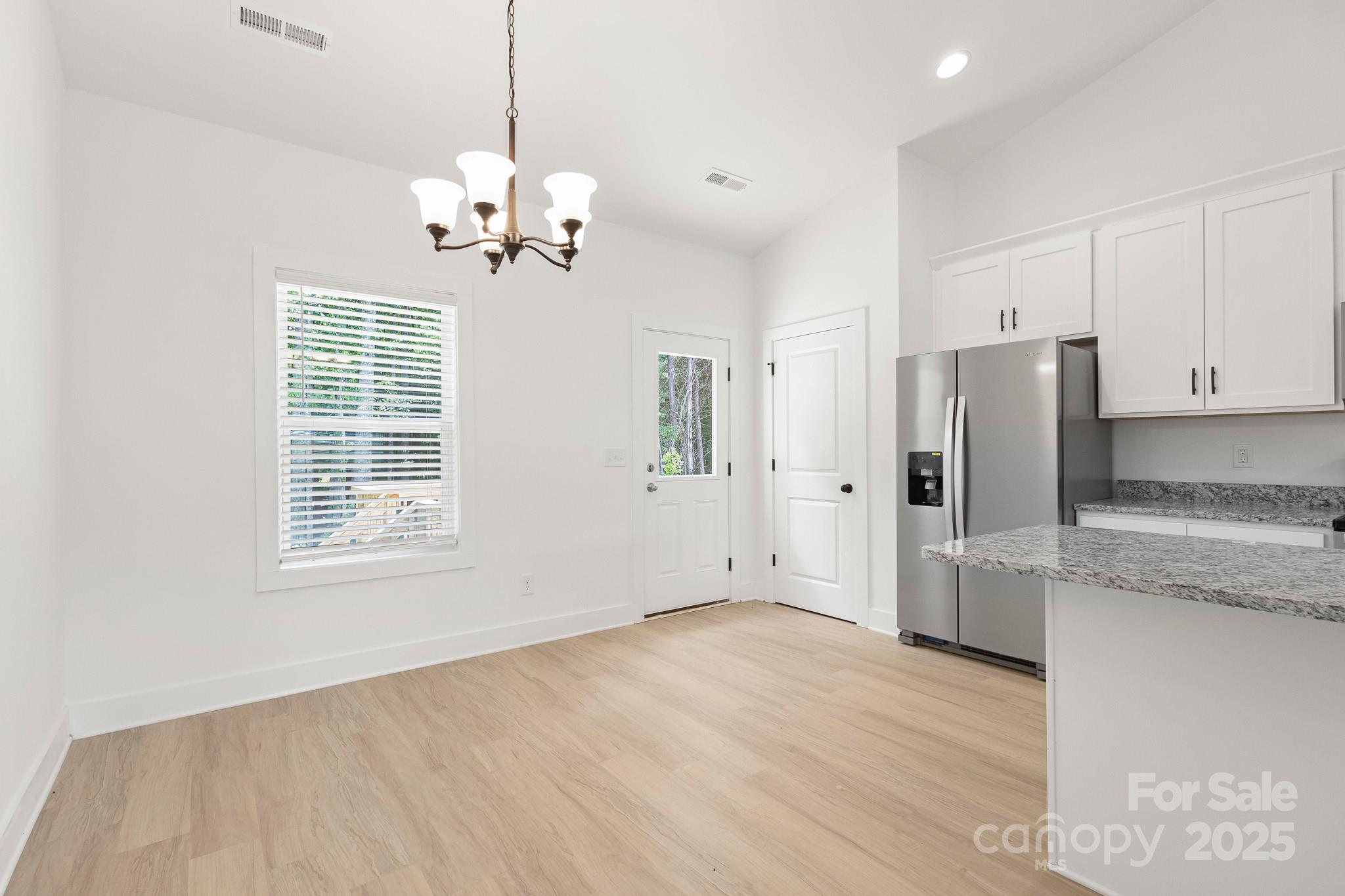 6155 Long Branch Road Salisbury, NC 28147 - Photo 14 of 35 a view of a kitchen with a sink and dishwasher
