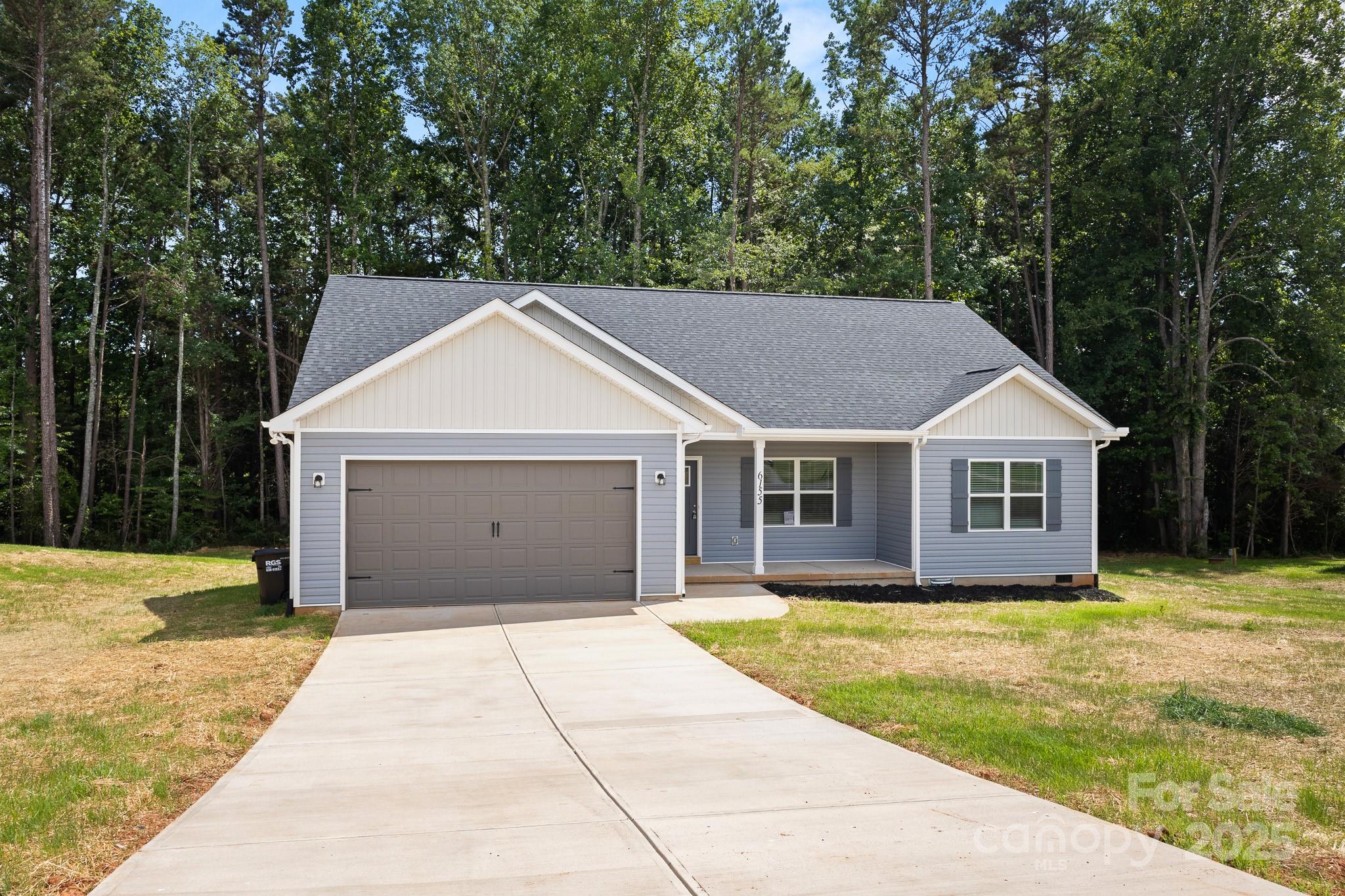 6155 Long Branch Road Salisbury, NC 28147 - Photo 2 of 35 a view of a house with a yard plants and large tree