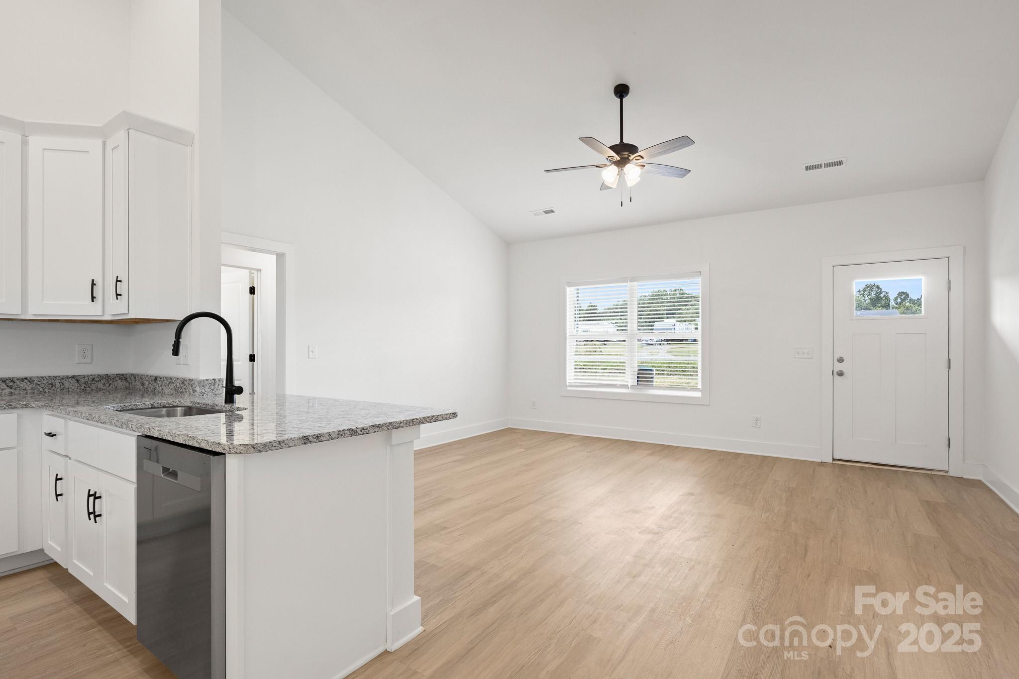 6155 Long Branch Road Salisbury, NC 28147 - Photo 7 of 35 a view of a kitchen with marble kitchen and sink