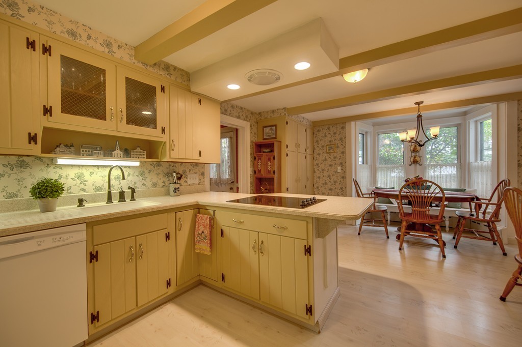 6 Oak Street Grafton, MA 01519 - Photo 11 of 27 a kitchen with a sink stove and cabinets