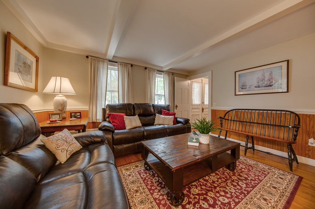 6 Oak Street Grafton, MA 01519 - Photo 13 of 27 a living room with furniture a rug and a window