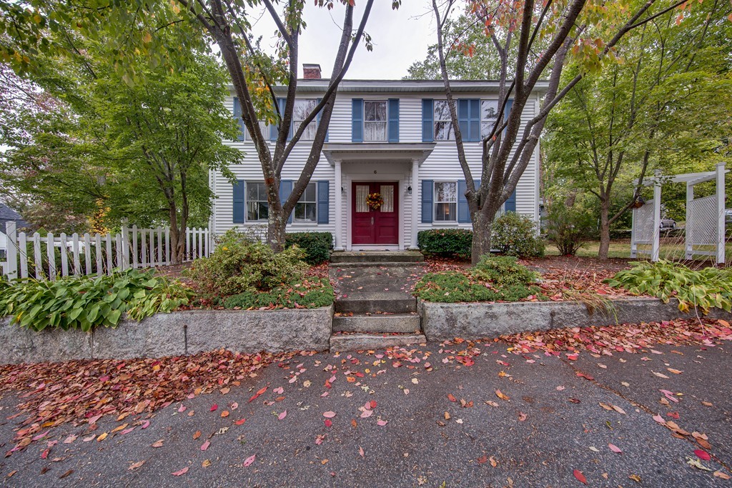 6 Oak Street Grafton, MA 01519 - Photo 2 of 27 a front view of a house with garden